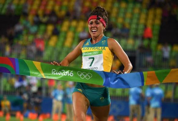Australia's Chloe Esposito crosses the line to win the modern pentathlon at Rio 2016